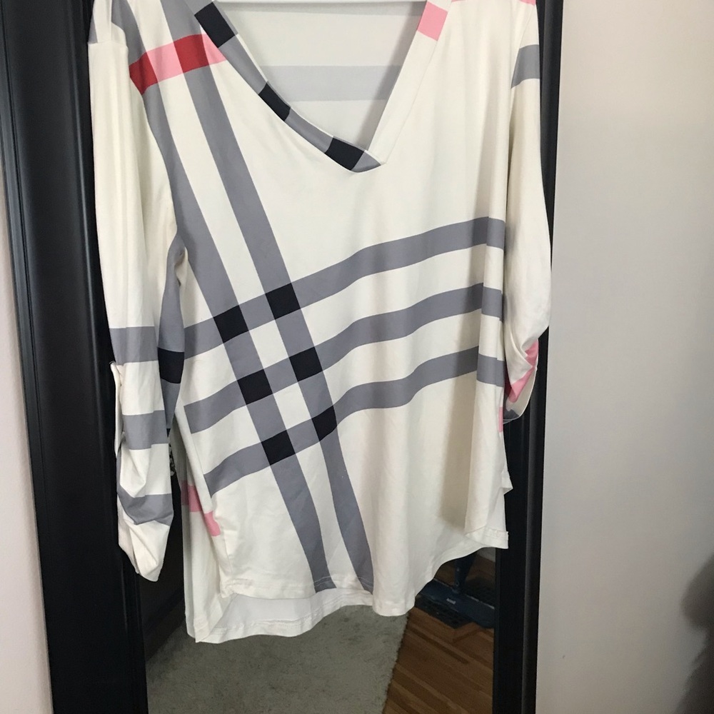 Two size large tops in great condition hardly worn